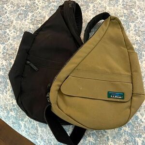 Two LLBean bags. One tan, one black.